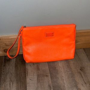 Nine West orange wristlet/clutch. 12” W x 9”H x 7” D opening.